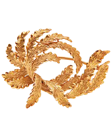 The Victorieux Lauriers brooch is a refined jewel, distinguished by its meticulous details and timeless elegance.