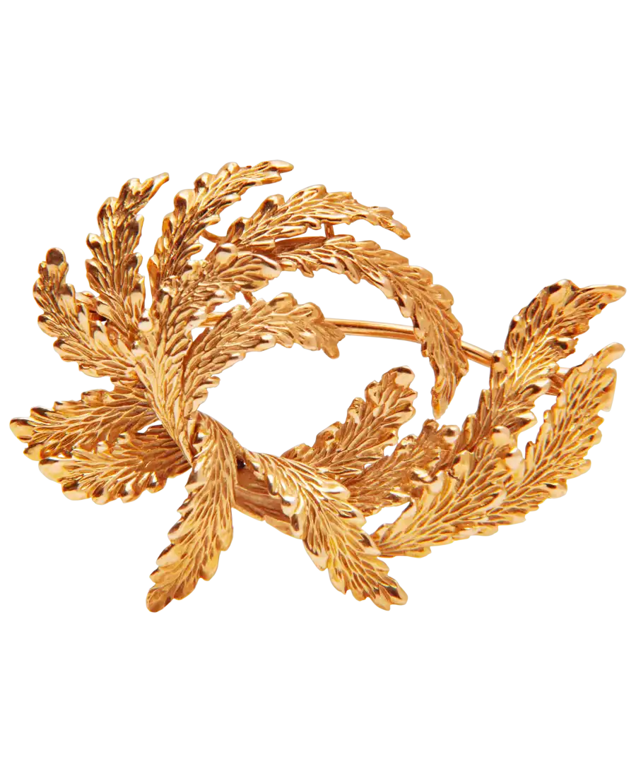 The Victorieux Lauriers brooch is a refined jewel, distinguished by its meticulous details and timeless elegance. The Victorieux Lauriers brooch is a refined jewel, distinguished by its meticulous details and timeless elegance.