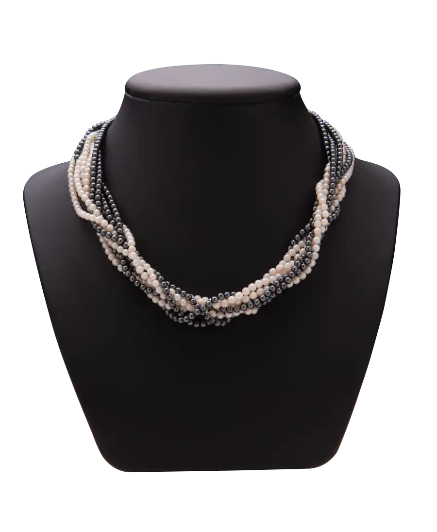 Prestige Multi-Strand Necklace with its black and white pearls. Available at VIRTU LUXURY. Prestige Multi-Strand Necklace with its black and white pearls. Available at VIRTU LUXURY.