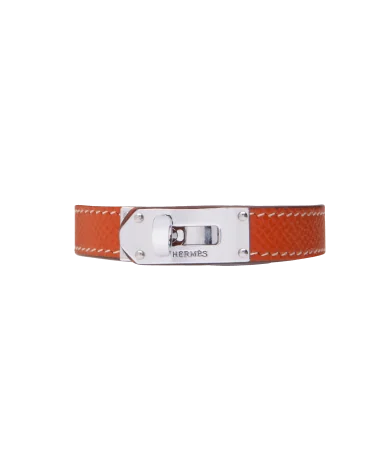 Bracelet from the luxury house Hermès in steel and orange leather. Available at VIRTU LUXURY.