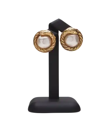 Intertwined Pearl Earring from the luxury house Chanel. Available at VIRTU LUXURY.