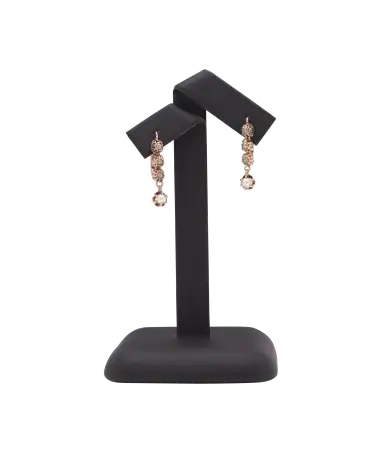 Antiqued Pendants is a pair of rose gold earrings. Available at VIRTU LUXURY.