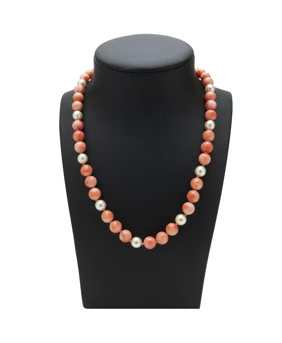 CORAL PEARLS necklace with 18 Karat yellow gold clasp. Available at VIRTU LUXURY.